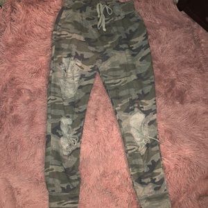 Fashion Nova Camo joggers  w/ holes